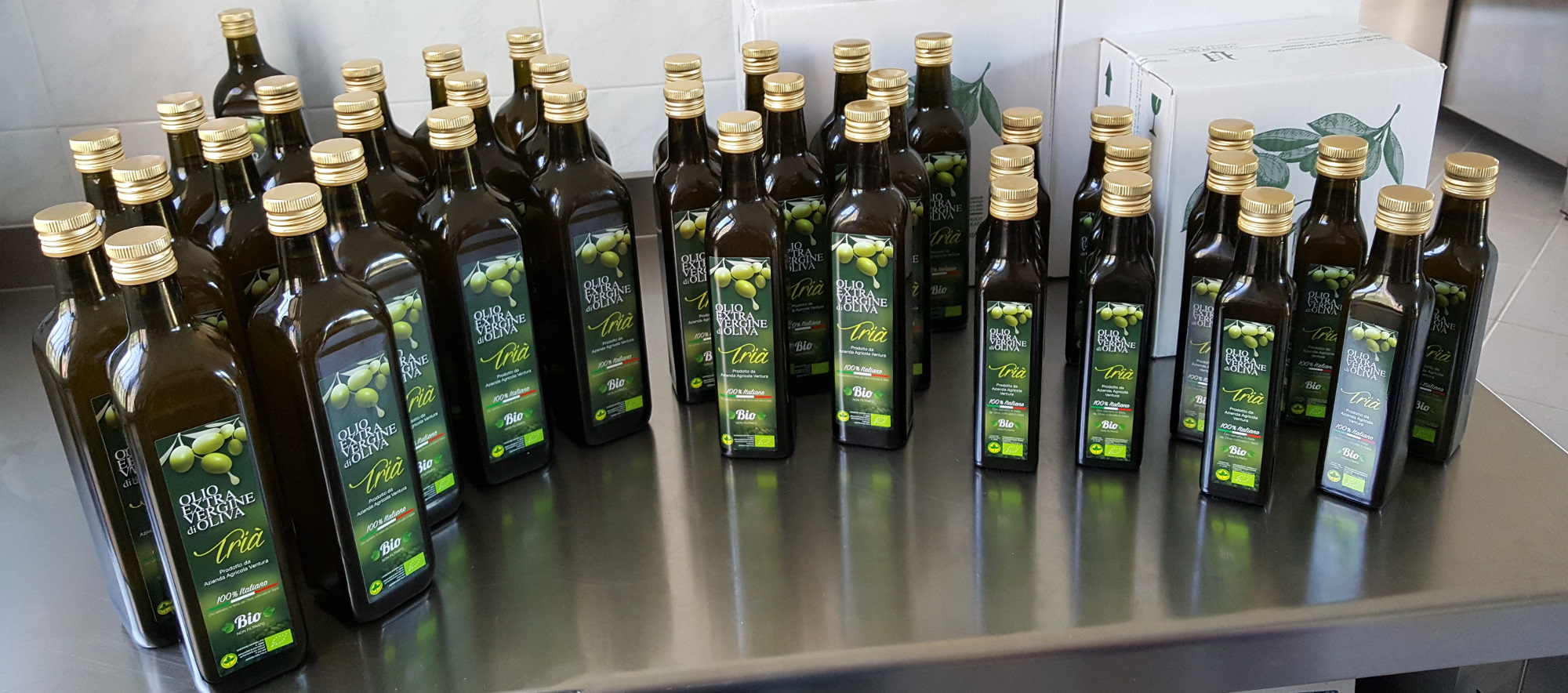 bottiglie olio biologico trià
